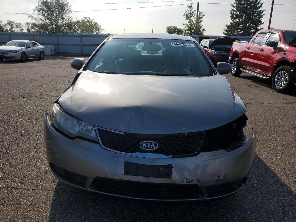 Photo 5 from auction – 2011 KIA FORTE with VIN KNAFU4A28B5889865