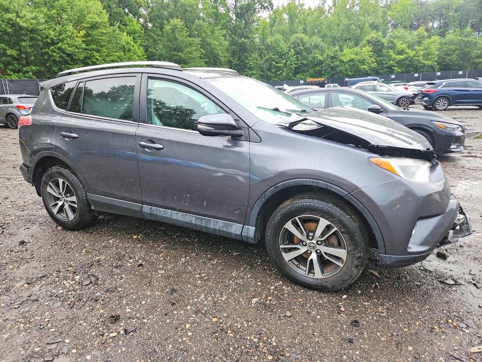 Photo 4 from auction – 2018 TOYOTA RAV4 with VIN 2T3RFREV7JW775438