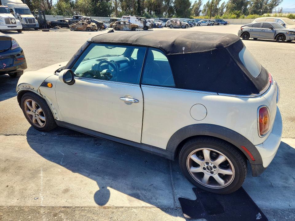 Photo 2 from auction – 2010 MINI COOPER with VIN WMWMR3C51ATU97296