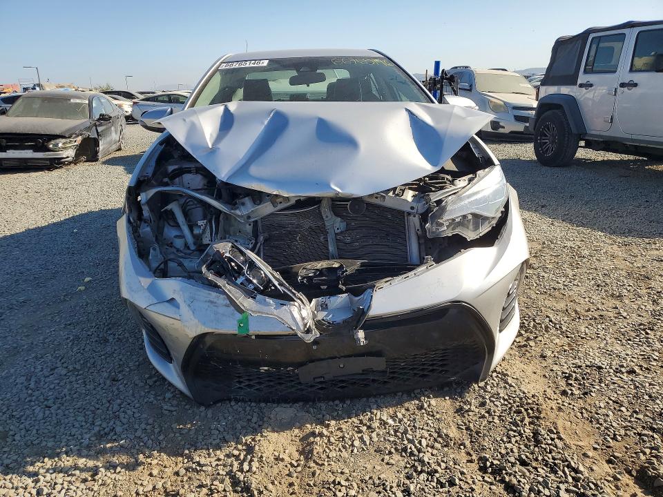 Photo 5 from auction – 2017 TOYOTA COROLLA with VIN 5YFBURHE0HP713807