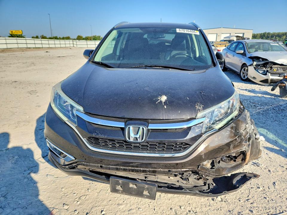 Photo 5 from auction – 2015 HONDA CR-V with VIN 5J6RM4H72FL083047