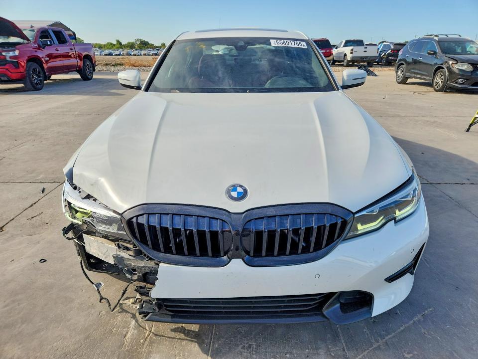 Photo 5 from auction – 2022 BMW 330XI with VIN 3MW5R7J07N8C23830