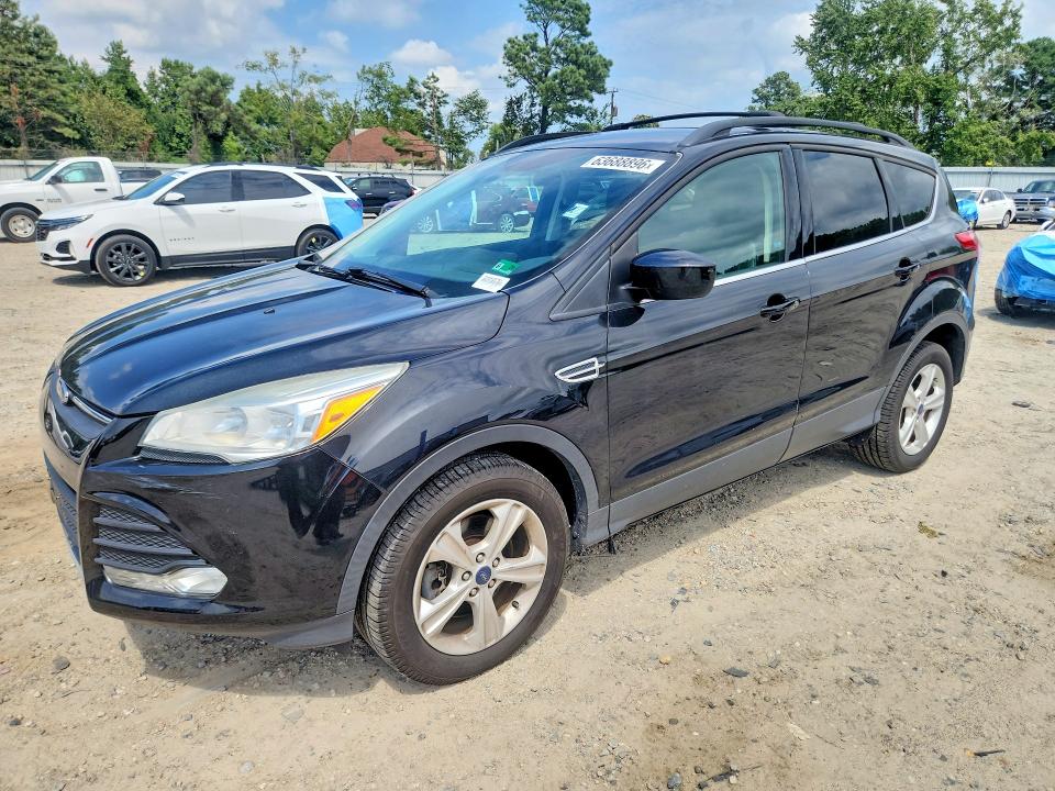 FORD ESCAPE 2015 with VIN 1FMCU9GXXFUC84985 - Photo from auction