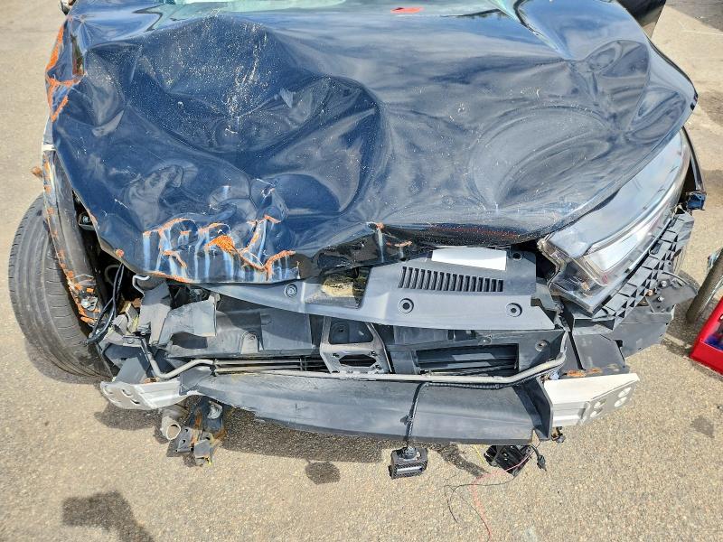 Photo 12 from auction – 2018 HONDA CR-V with VIN 7FARW2H94JE034941