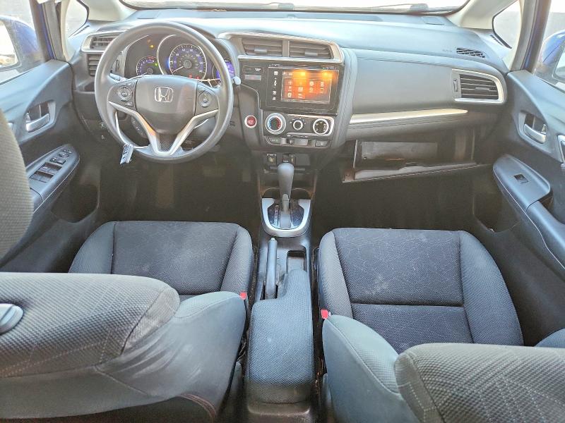 Снимка 8 от търг – 2016 HONDA FIT с VIN JHMGK5H75GS008521