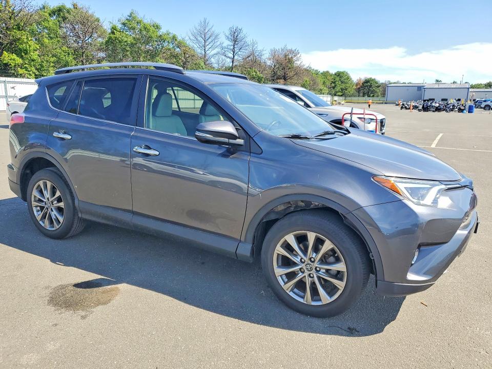 Photo 4 from auction – 2018 TOYOTA RAV4 with VIN JTMDFREV3JD253977