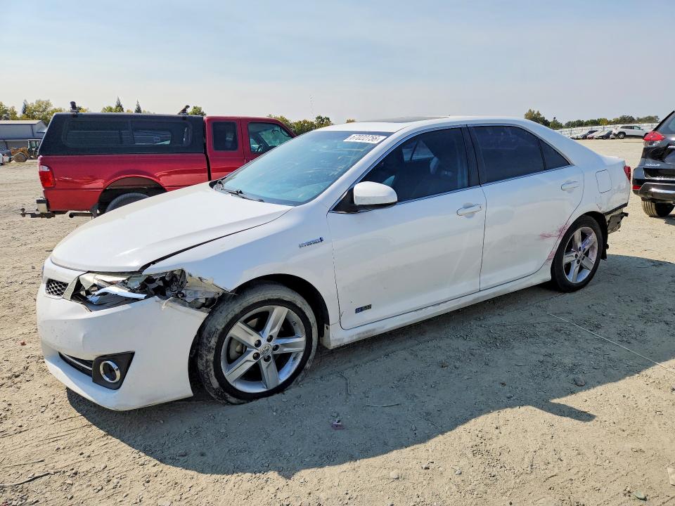TOYOTA CAMRY HYBRID 2014 с VIN 4T1BD1FKXEU130830 - Снимка от търг