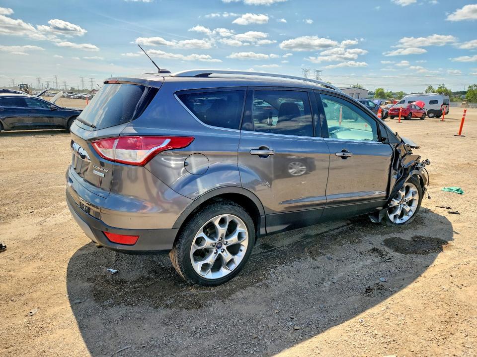 Photo 3 from auction – 2014 FORD ESCAPE with VIN 1FMCU0J91EUA27847