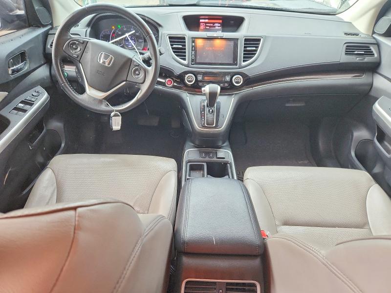 Photo 8 from auction – 2015 HONDA CR-V with VIN 2HKRM4H73FH654569