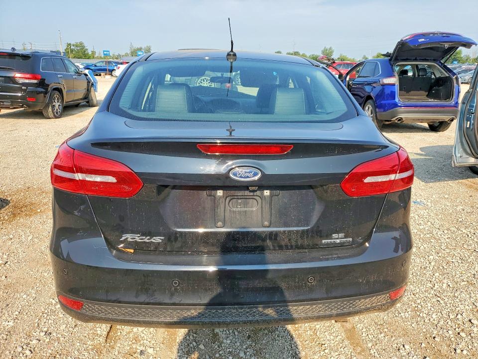 Photo 6 from auction – 2016 FORD FOCUS with VIN 1FADP3F28GL268025