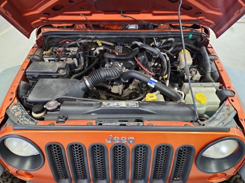 Photo 11 from auction – 2011 JEEP WRANGLER with VIN 1J4AA2D18BL569142