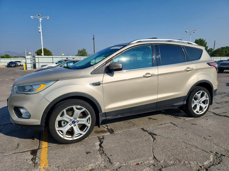 FORD ESCAPE 2017 with VIN 1FMCU9J93HUE47537 - Photo from auction
