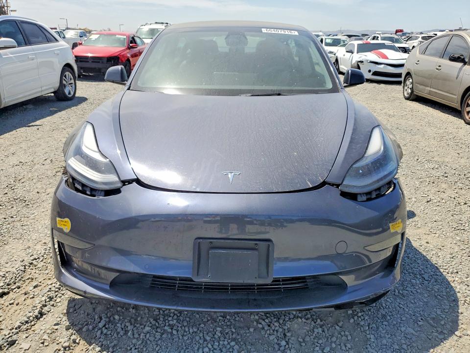 Foto 5 de la subasta – 2021 TESLA MODEL 3 con VIN 5YJ3E1EA7MF096609