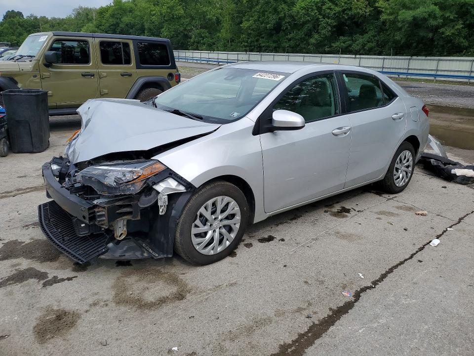 TOYOTA COROLLA 2017 with VIN 2T1BURHE4HC810699 - Photo from auction