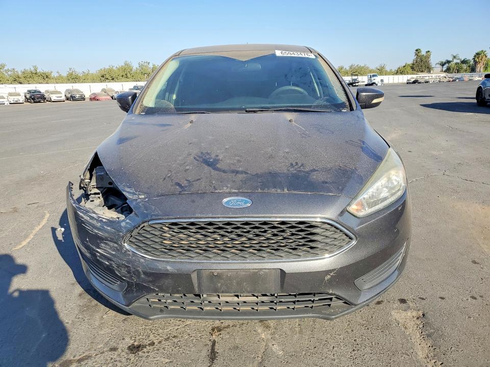 Photo 5 from auction – 2017 FORD FOCUS with VIN 1FADP3F26HL285715