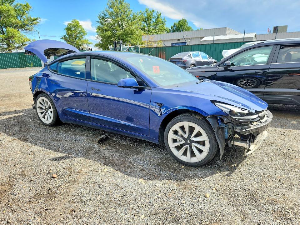 Photo 4 from auction – 2022 TESLA MODEL 3 with VIN 5YJ3E1EA9NF369843