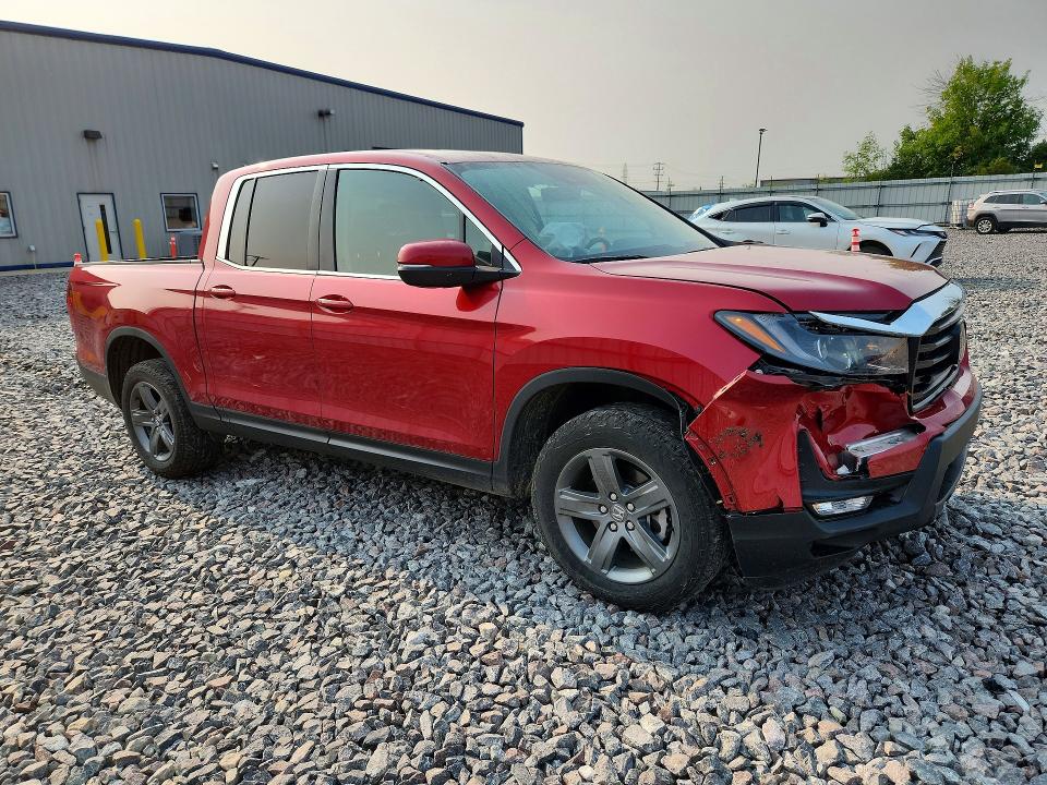 Photo 4 from auction – 2023 HONDA RIDGELINE with VIN 5FPYK3F54PB037167