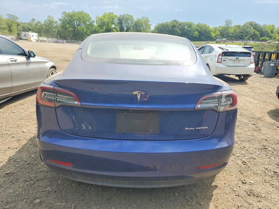Photo 6 from auction – 2022 TESLA MODEL 3 with VIN 5YJ3E1EBXNF334995