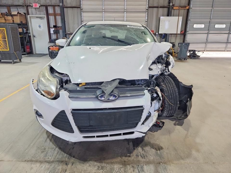 Снимка 5 от търг – 2013 FORD FOCUS с VIN 1FADP3K25DL112350
