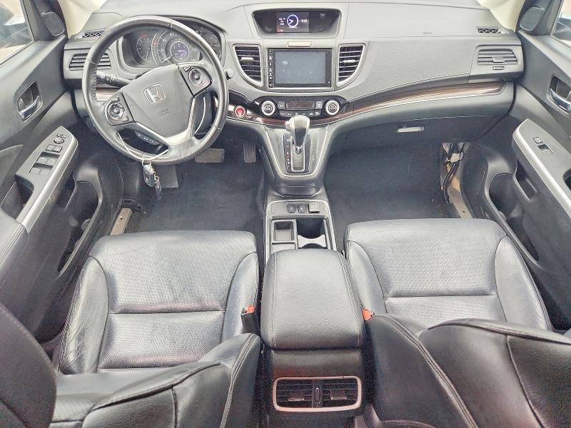 Photo 8 from auction – 2016 HONDA CR-V with VIN 2HKRM4H79GH689702