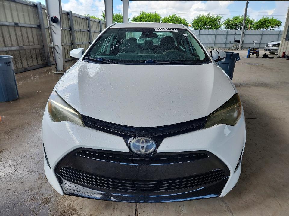 Photo 5 from auction – 2019 TOYOTA COROLLA with VIN 5YFBURHE2KP877602