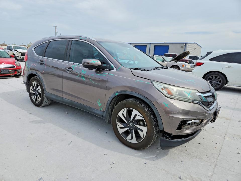 Photo 4 from auction – 2016 HONDA CR-V with VIN 5J6RM3H96GL031420
