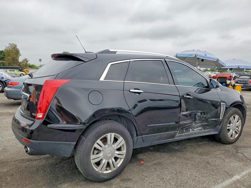 Photo 3 from auction – 2015 CADILLAC SRX with VIN 3GYFNBE36FS597130