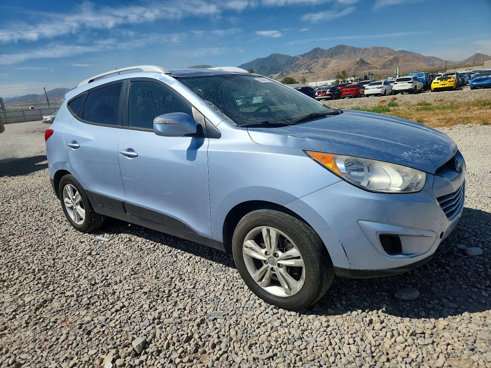 Photo 4 from auction – 2012 HYUNDAI TUCSON with VIN KM8JUCAC6CU379940
