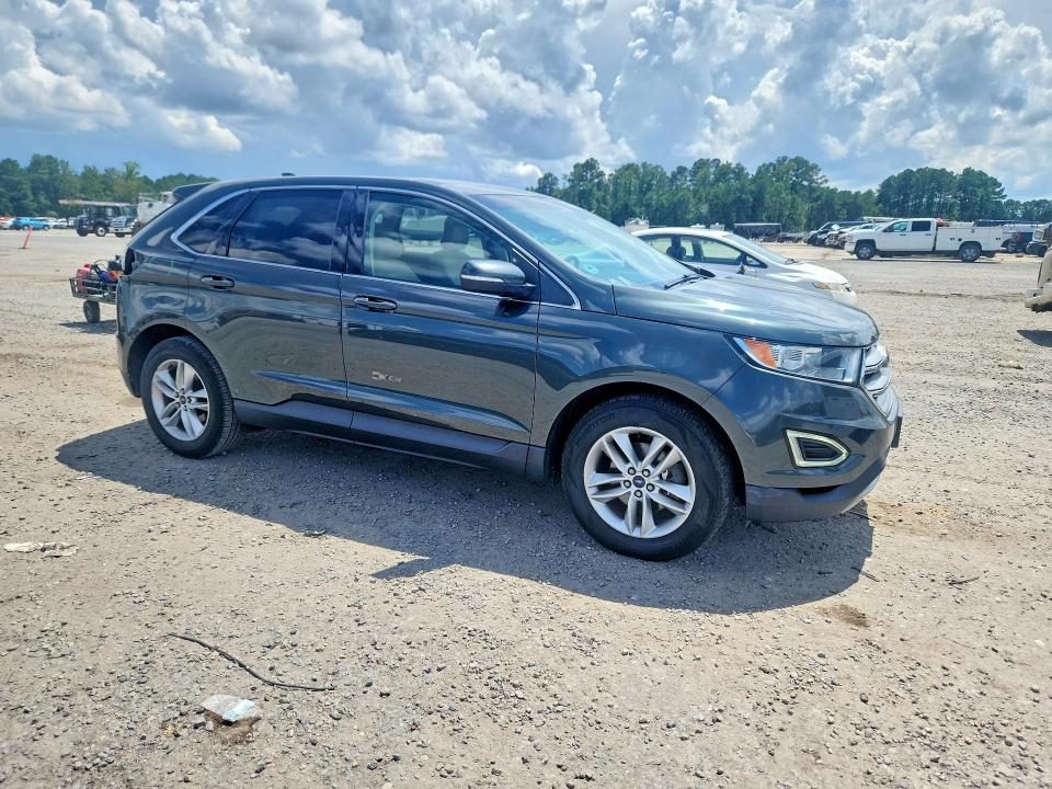 Photo 4 from auction – 2015 FORD EDGE with VIN 2FMTK3J9XFBB40971