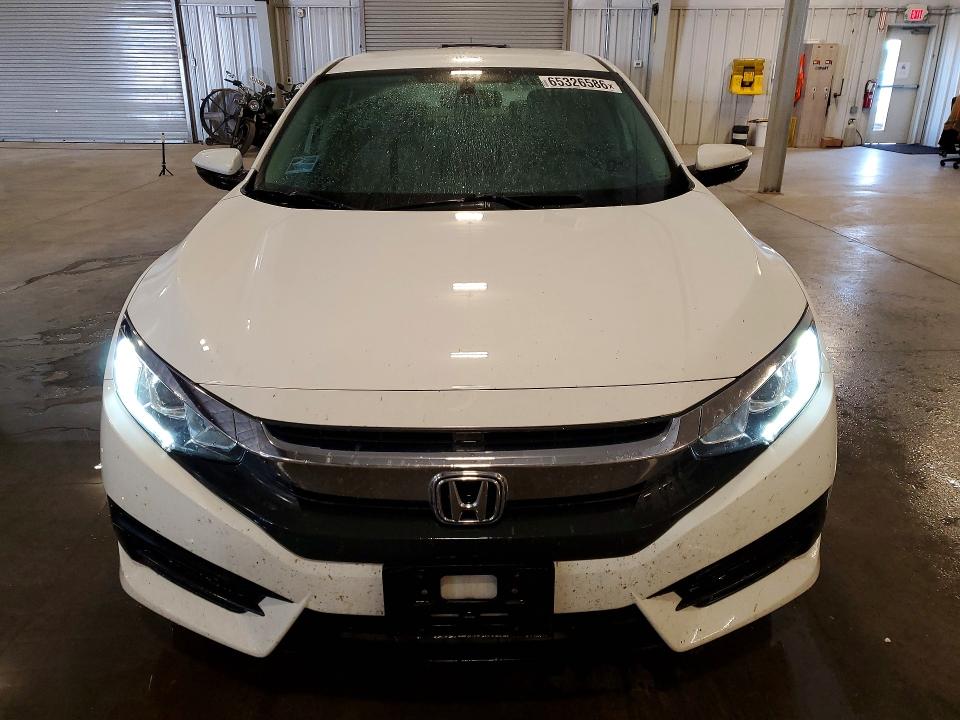 Photo 5 from auction – 2016 HONDA CIVIC with VIN 19XFC2F59GE058996