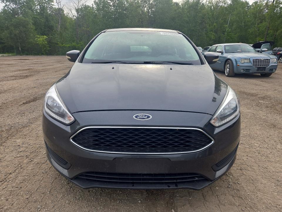 Photo 5 from auction – 2016 FORD FOCUS with VIN 1FADP3F2XGL349494