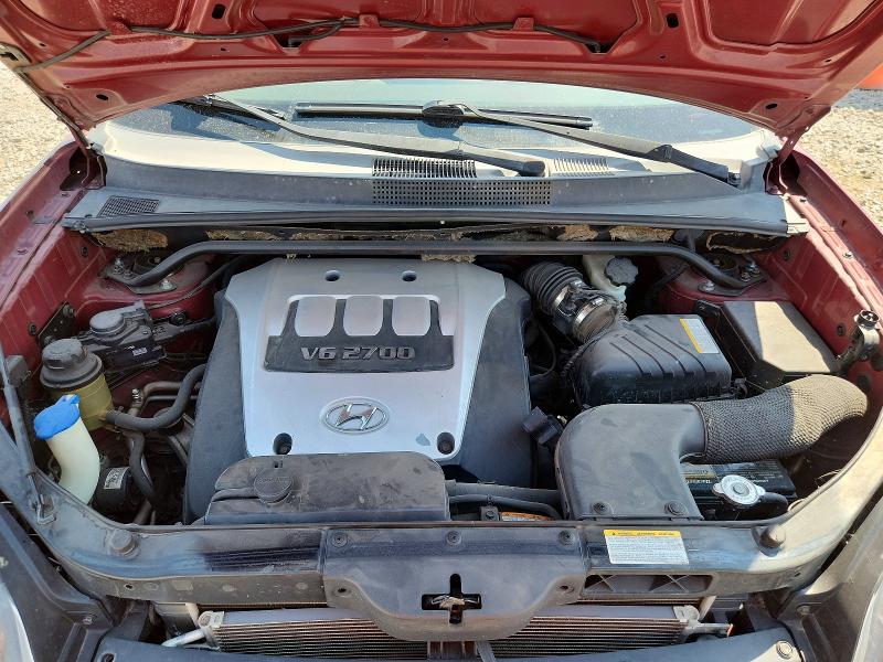 Photo 11 from auction – 2006 HYUNDAI TUCSON with VIN KM8JN72D76U257538