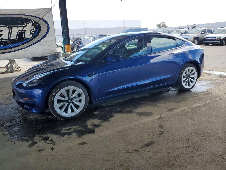 TESLA MODEL 3 2022 with VIN 5YJ3E1EAXNF143469 - Photo from auction