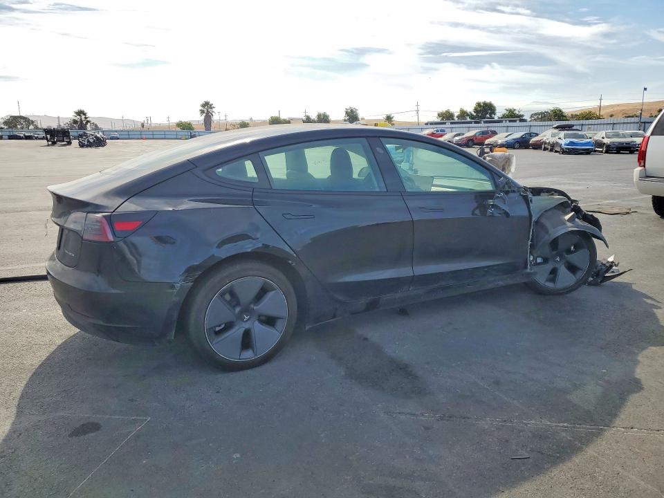 Photo 3 from auction – 2022 TESLA MODEL 3 with VIN 5YJ3E1EB4NF297488