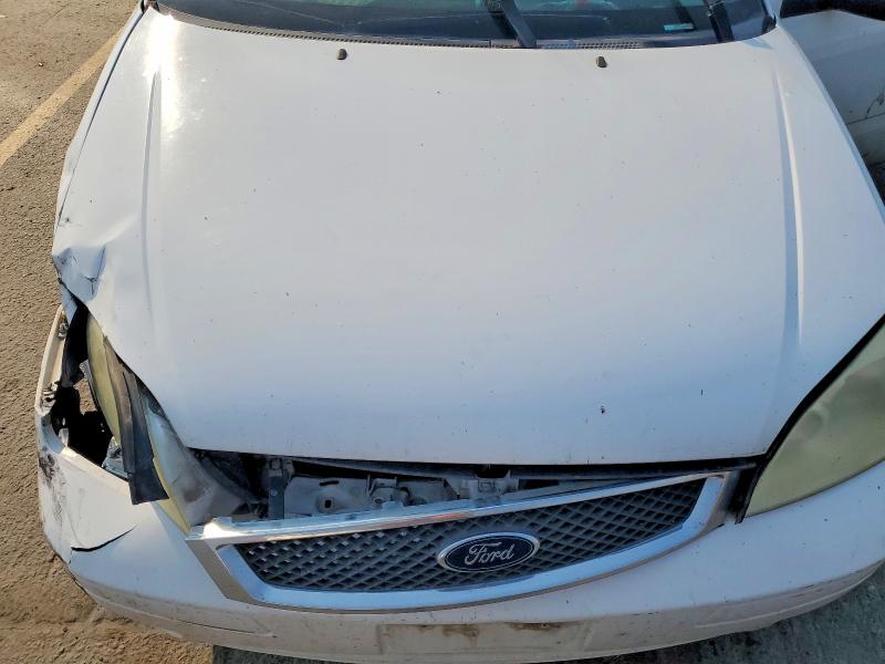 Photo 11 from auction – 2007 FORD FOCUS with VIN 1FAFP31N57W117376