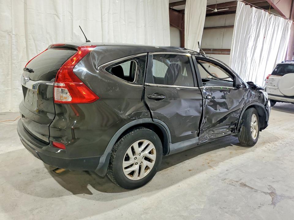 Photo 3 from auction – 2016 HONDA CR-V with VIN 2HKRM3H51GH542007