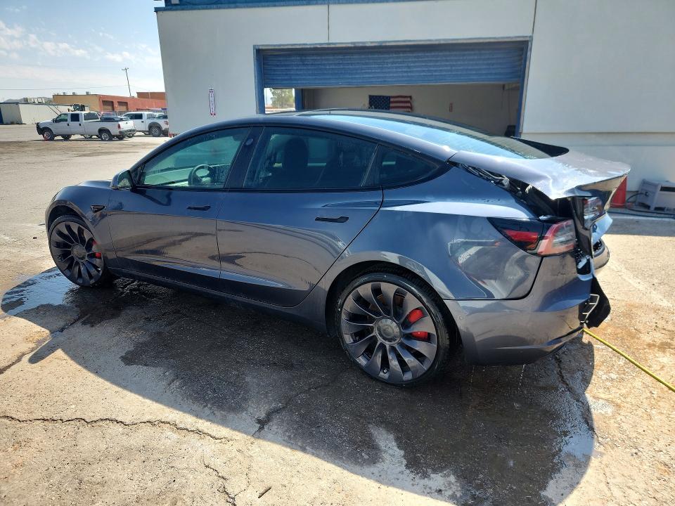 Photo 2 from auction – 2021 TESLA MODEL 3 with VIN 5YJ3E1EC9MF913645