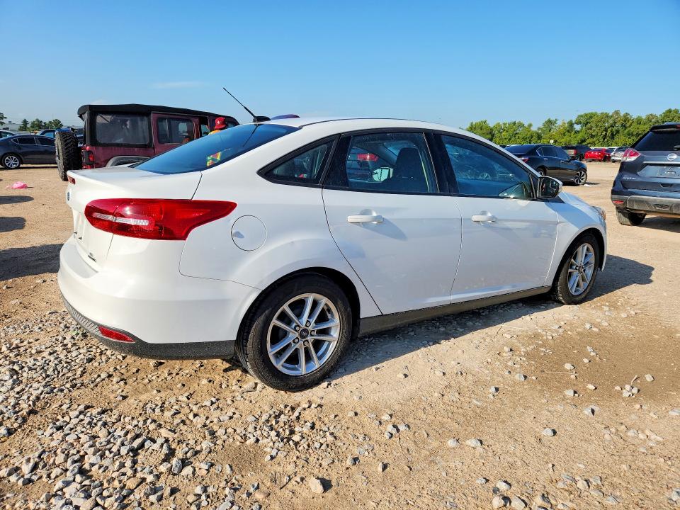 Photo 3 from auction – 2016 FORD FOCUS with VIN 1FADP3F27GL391234