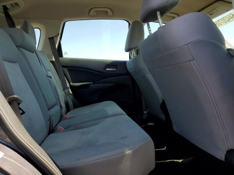 Photo 11 from auction – 2015 HONDA CR-V with VIN 3CZRM3H30FG700580