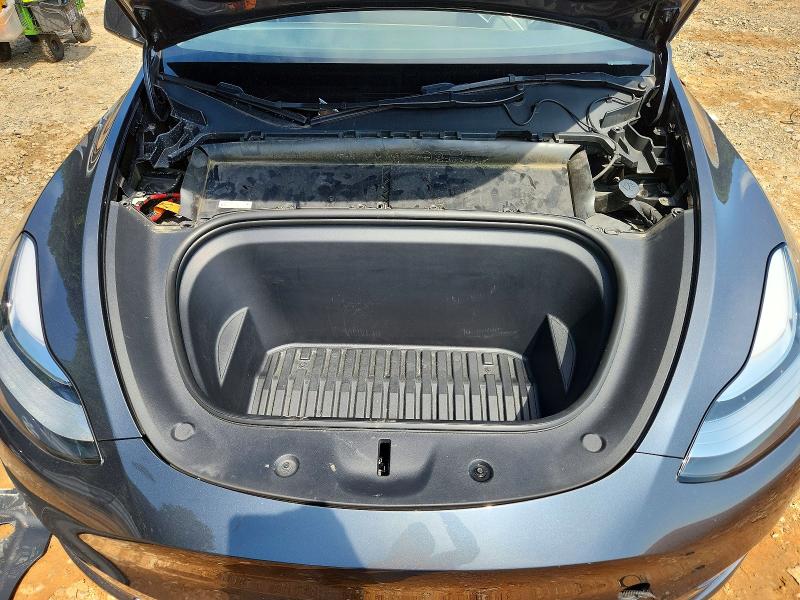 Photo 11 from auction – 2023 TESLA MODEL Y with VIN 7SAYGDEE0PA038298