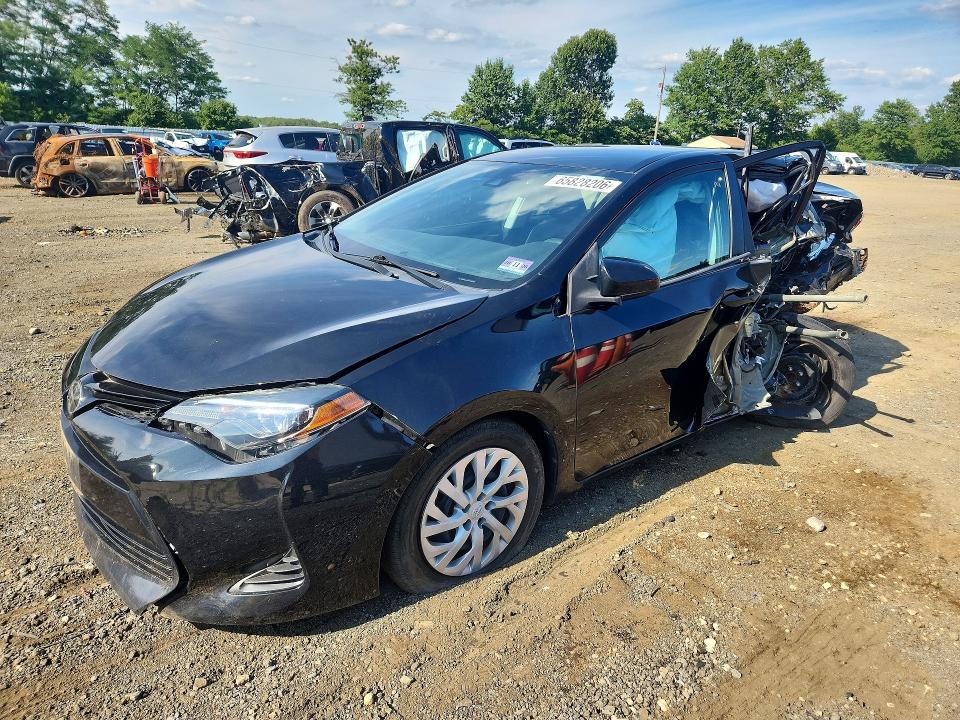 TOYOTA COROLLA 2017 with VIN 5YFBURHE4HP634253 - Photo from auction