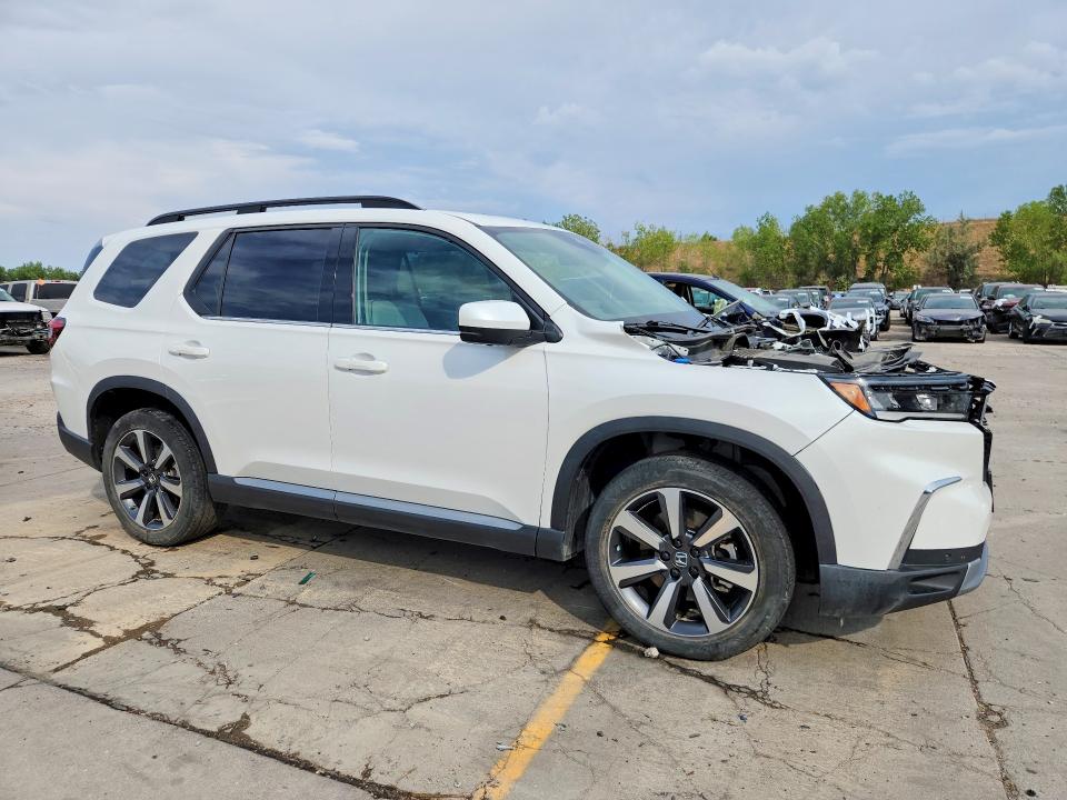 Photo 4 from auction – 2023 HONDA PILOT with VIN 5FNYG1H81PB001510