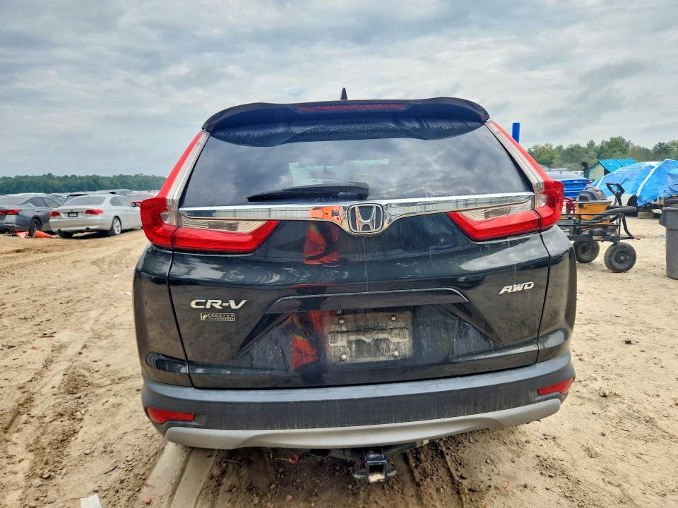 Photo 6 from auction – 2018 HONDA CR-V with VIN 7FARW2H88JE009791