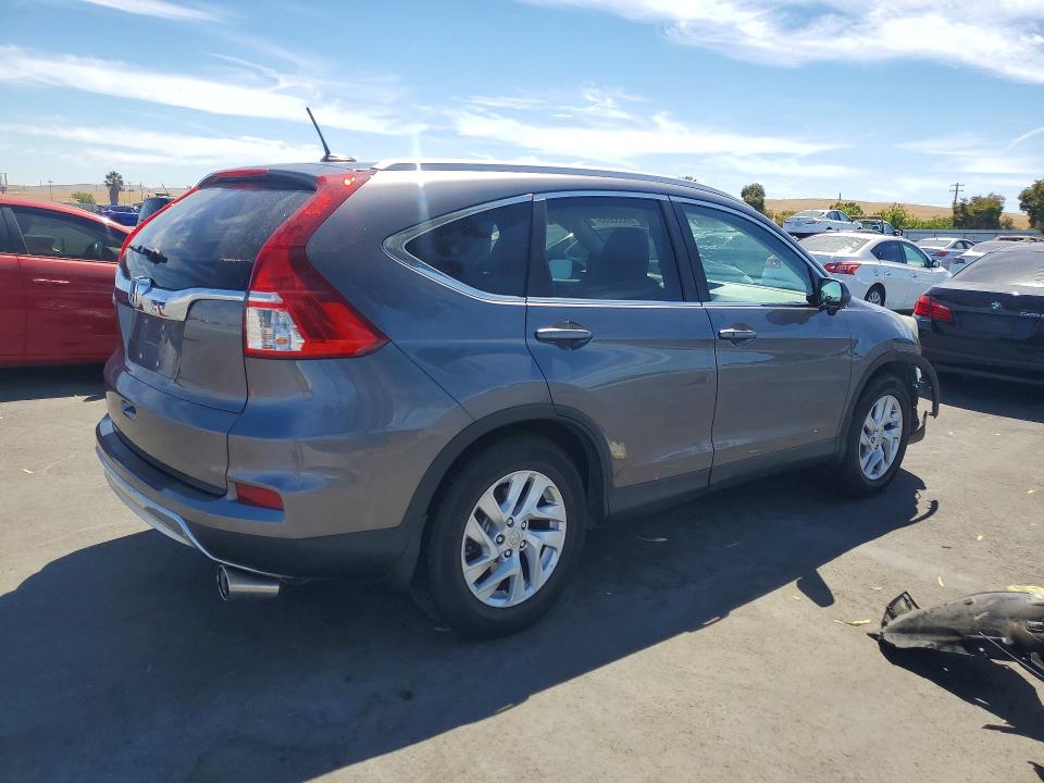 Photo 3 from auction – 2015 HONDA CR-V with VIN 2HKRM3H77FH503292
