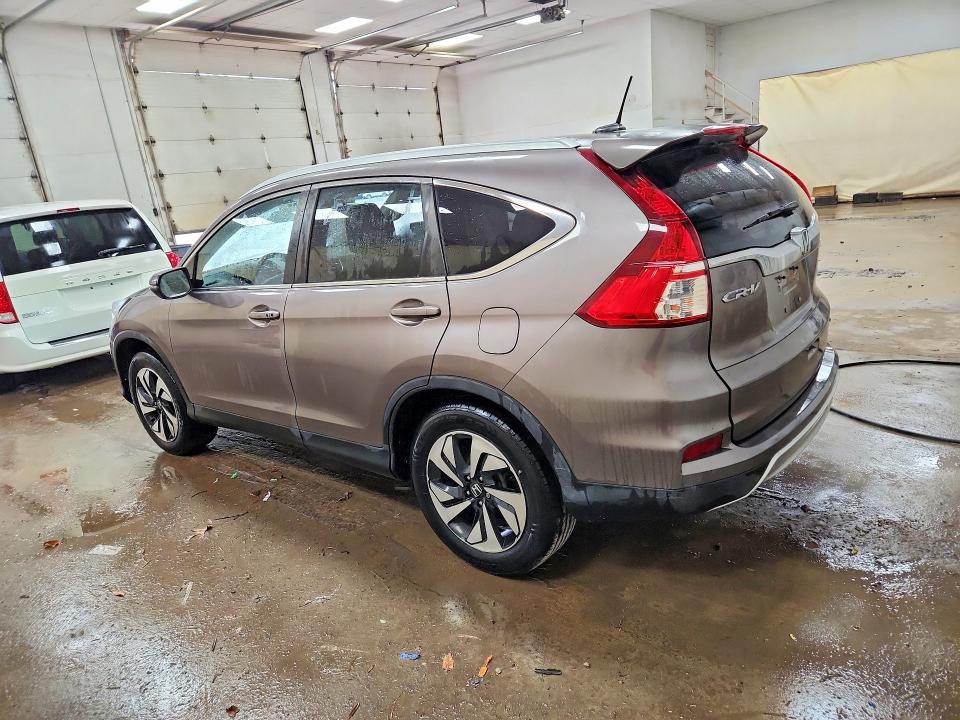 Photo 2 from auction – 2015 HONDA CR-V with VIN 5J6RM4H93FL061589