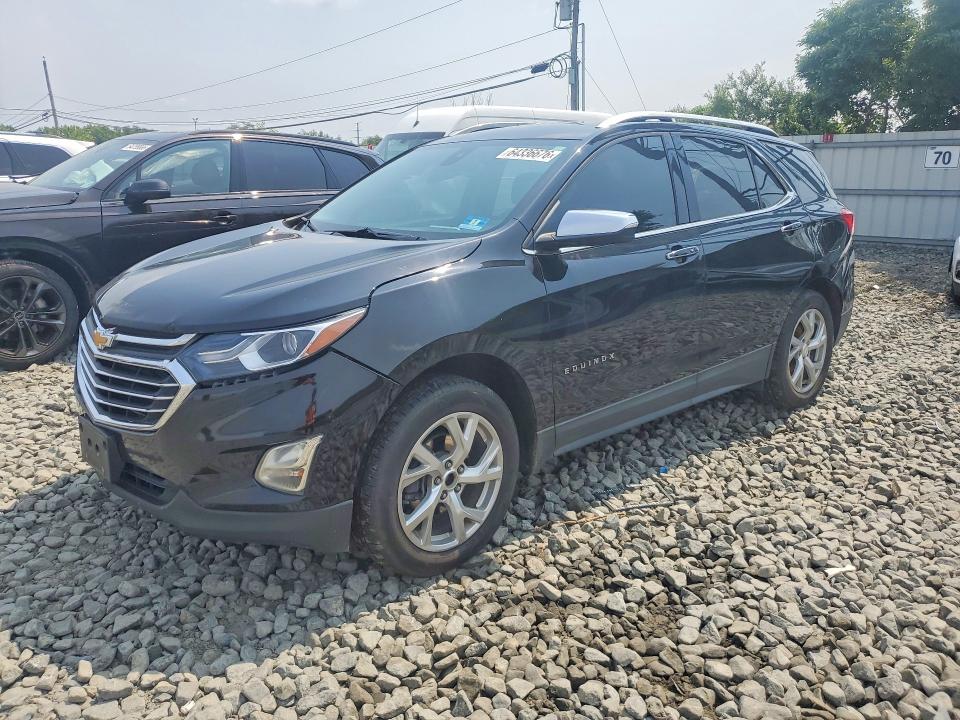 CHEVROLET EQUINOX 2018 with VIN 2GNAXVEV7J6132898 - Photo from auction