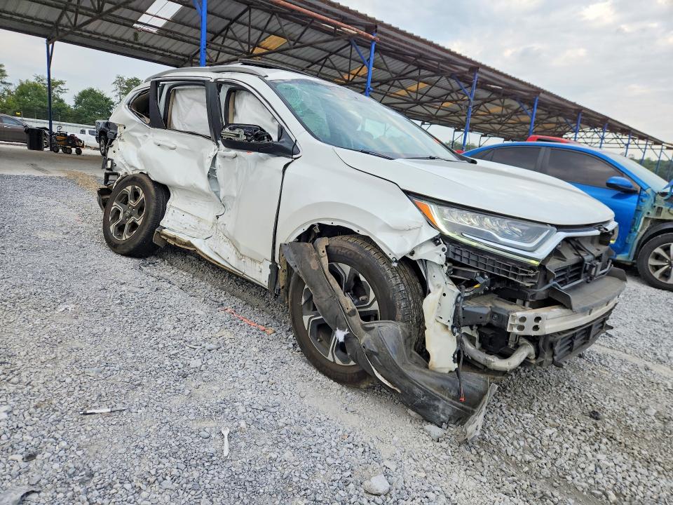 Photo 4 from auction – 2019 HONDA CR-V with VIN 7FARW1H92KE012657