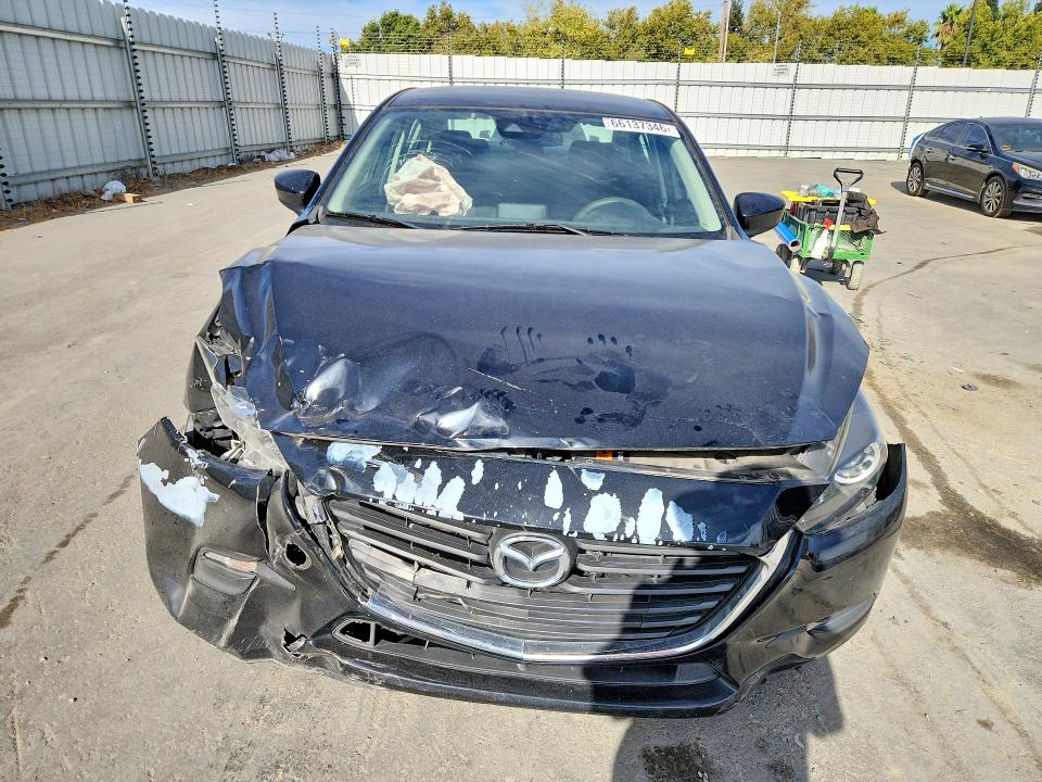 Photo 5 from auction – 2018 MAZDA 3 with VIN 3MZBN1U76JM228927