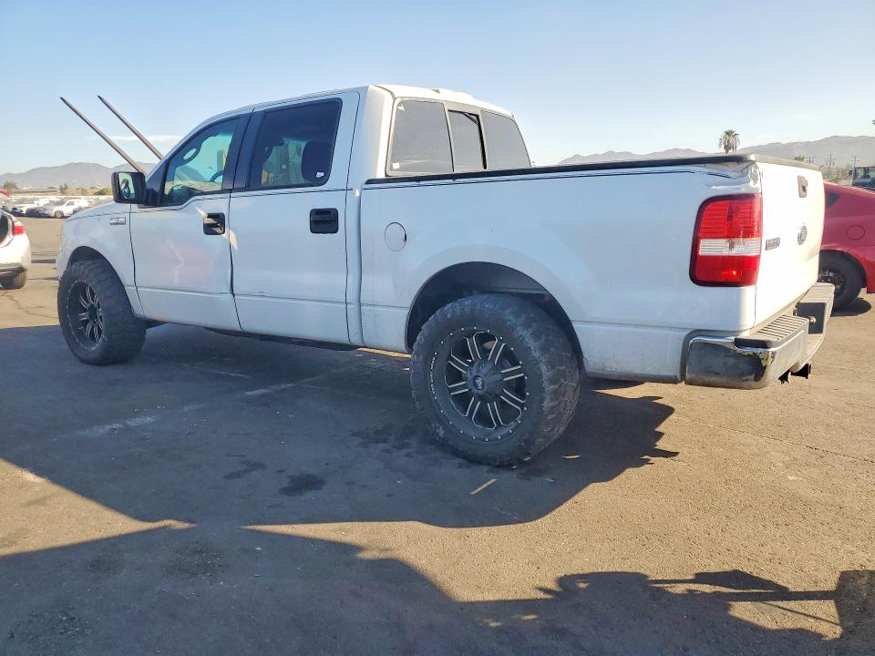 Photo 2 from auction – 2005 FORD F150 with VIN 1FTPW12505FA13735