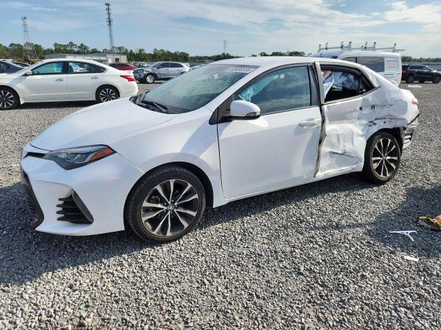 TOYOTA COROLLA 2017 with VIN 5YFBURHE3HP614821 - Photo from auction
